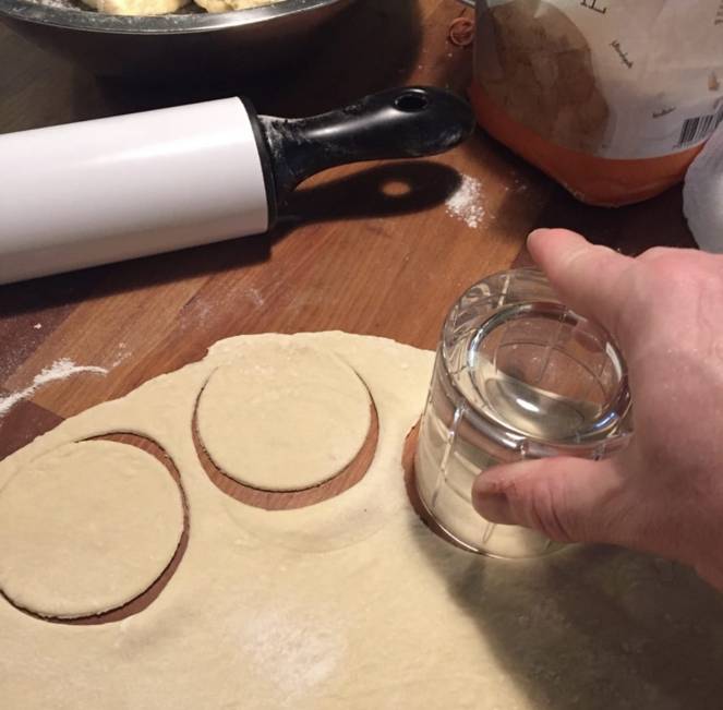 Pierogi dough being cut