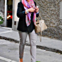 She is casual but she is still wearing a blazer, scarf and high heels. Photo credit: http://www.zquotes.net/